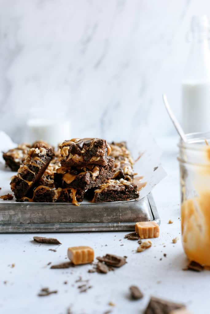 Close up of Chocolate Turtle Brownies on a turned over sheet pan.
