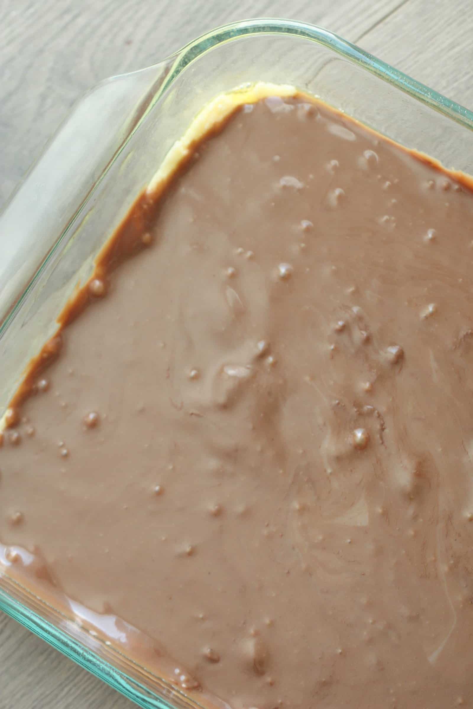 Chocolate layer of Cake Mix Cookie Bars in a 9x13 pan