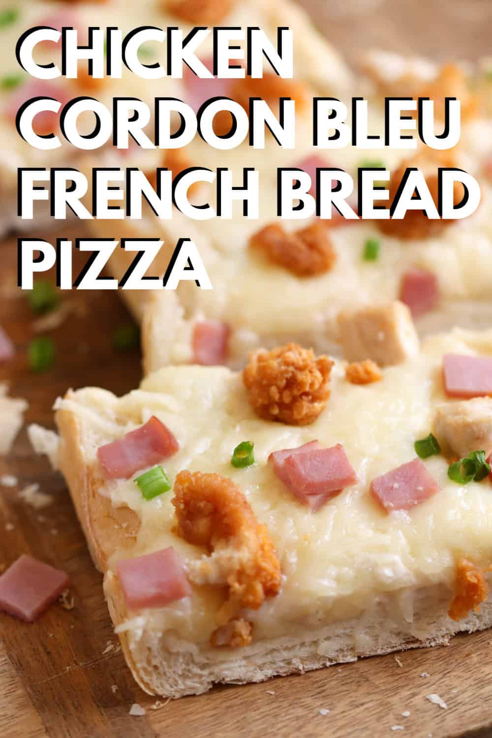 Chicken Cordon Bleu French Bread Pizza sliced on a cutting board