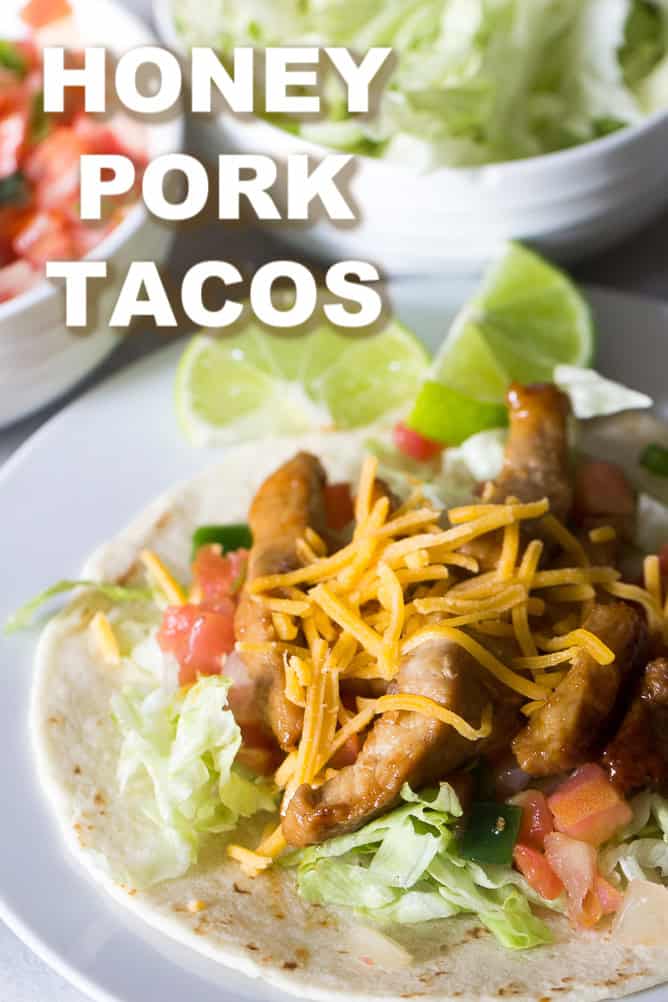 Plated Honey Pork Tacos with cheese on top