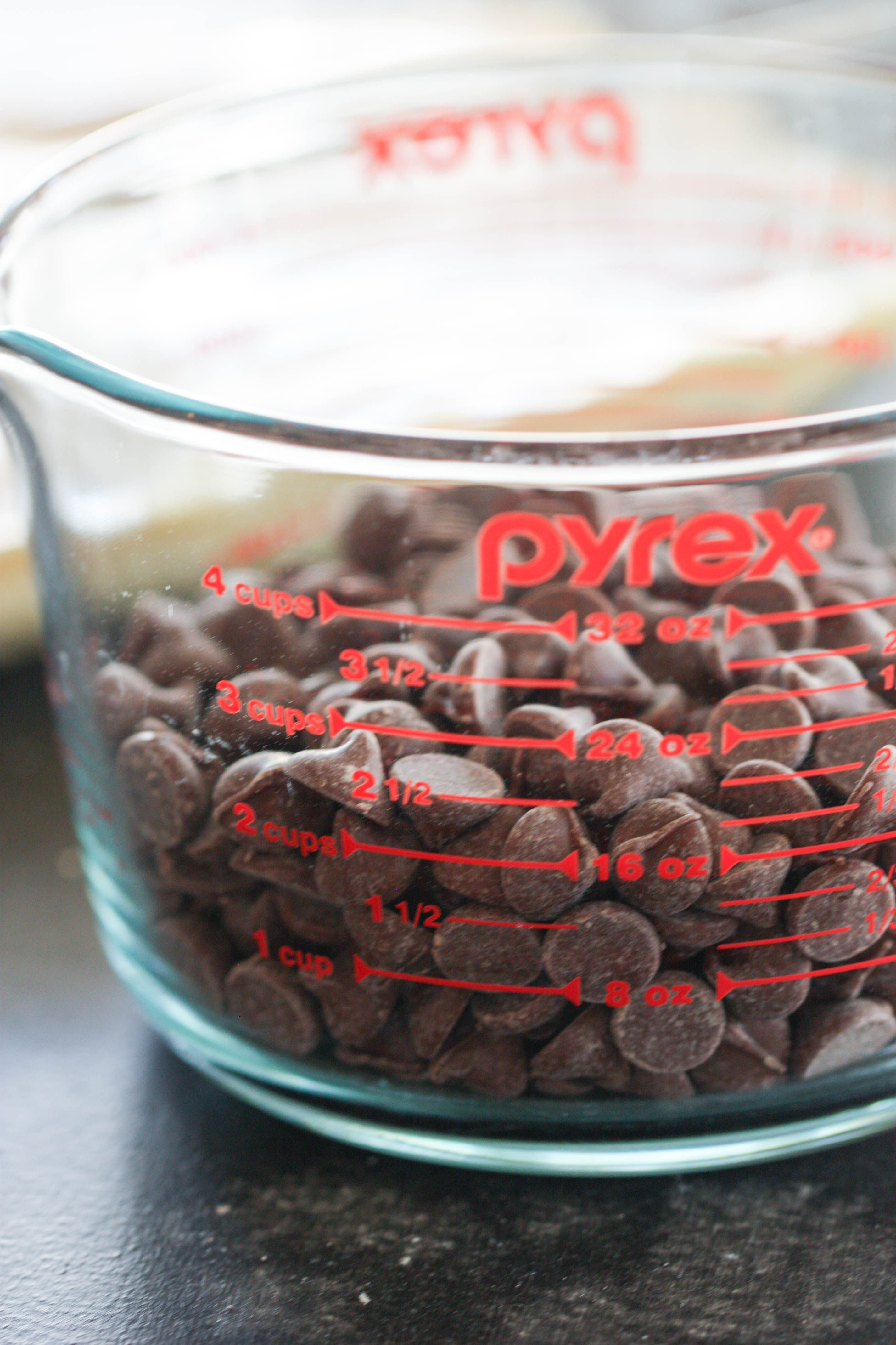 Chocolate chips in a pyrex measuring cup