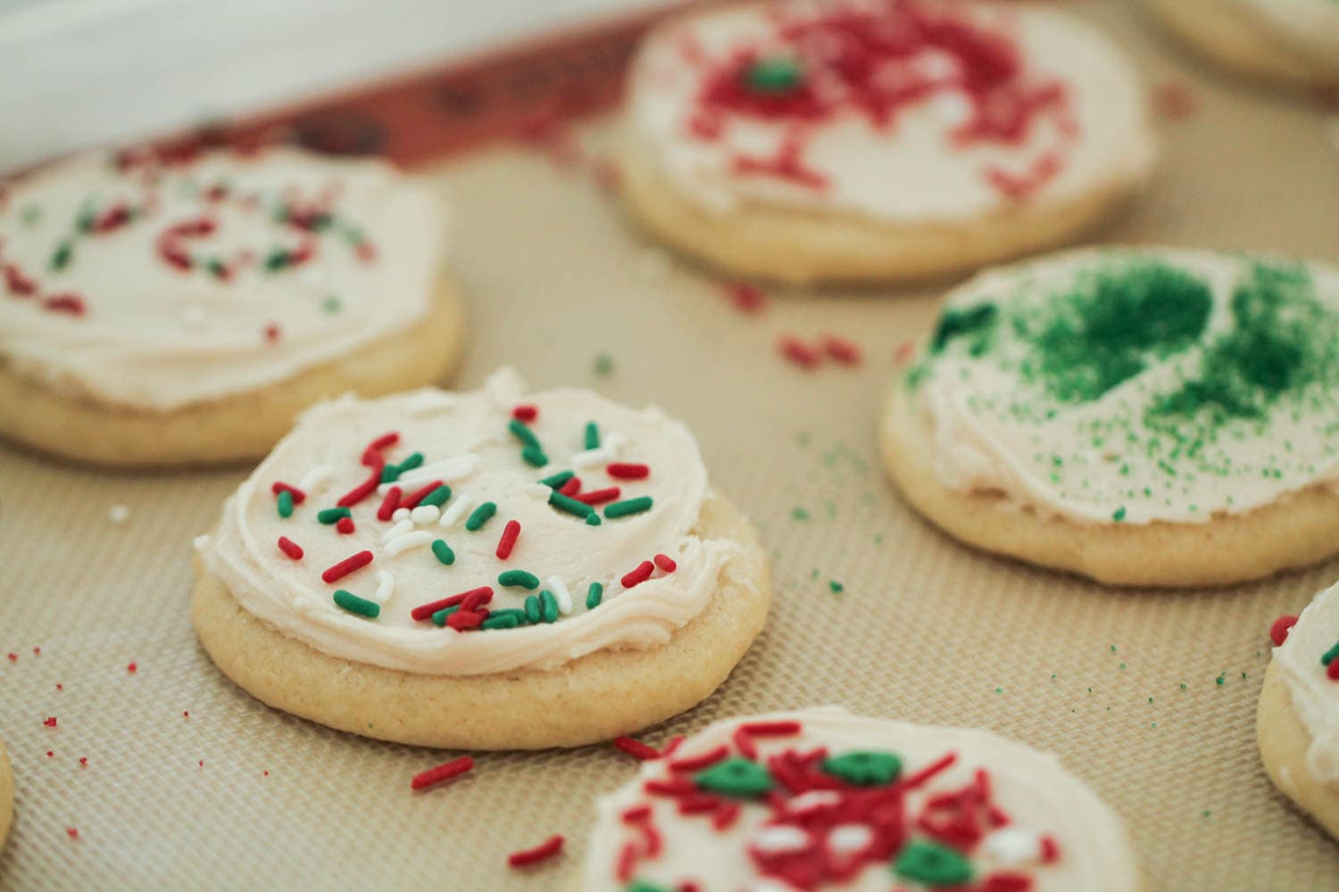 Frosted cookies on cookie sheet for six sisters stuff