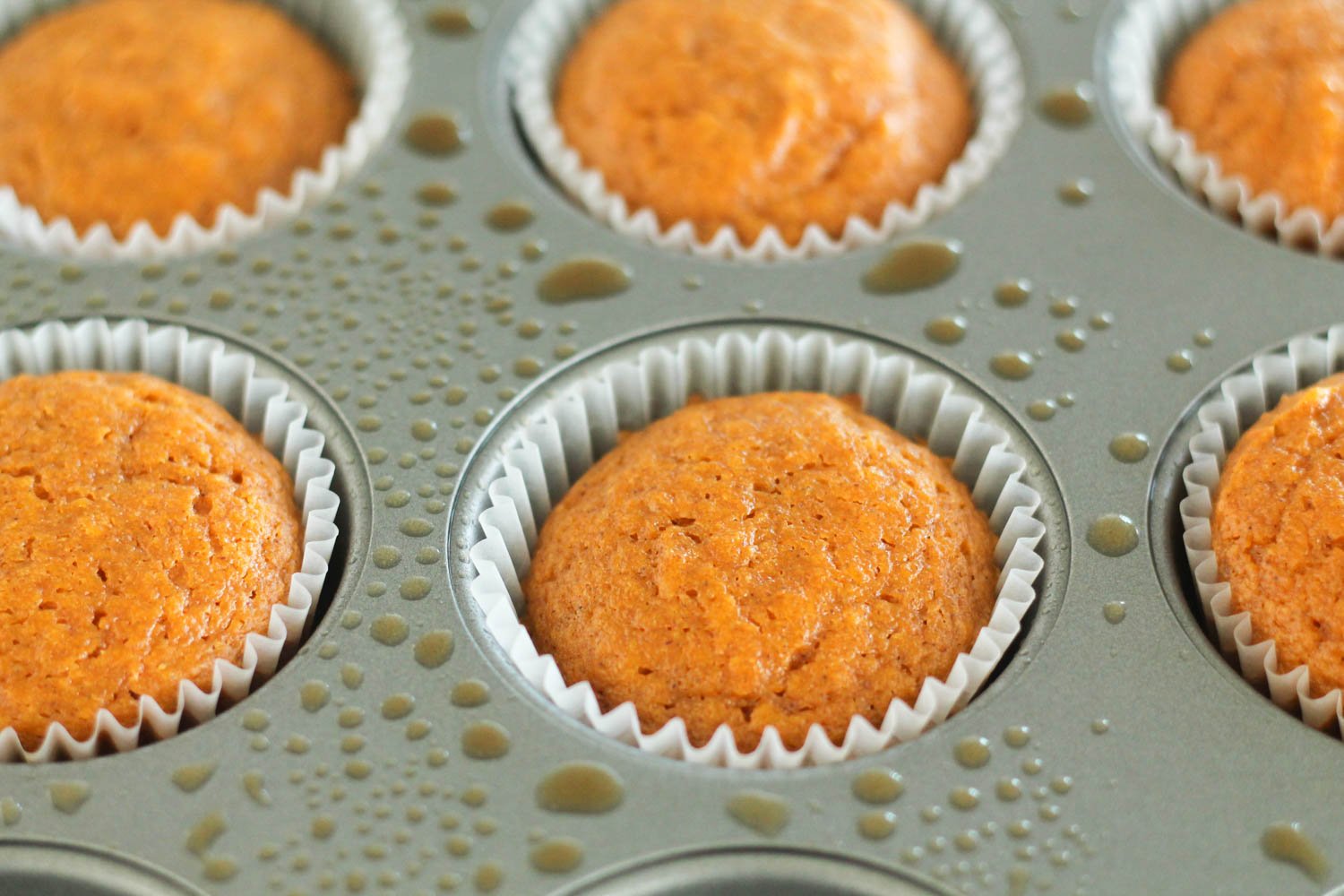 Muffin tin with baked Pumpkin Pie Cupcakes
