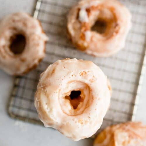 Puff Pastry Donuts on a cooling rack.