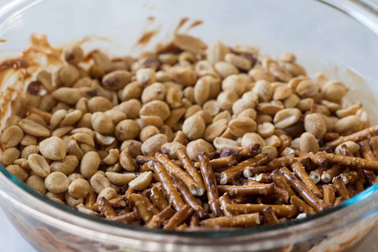 peanuts and pretzels in bowl for chubby hubby clusters. 