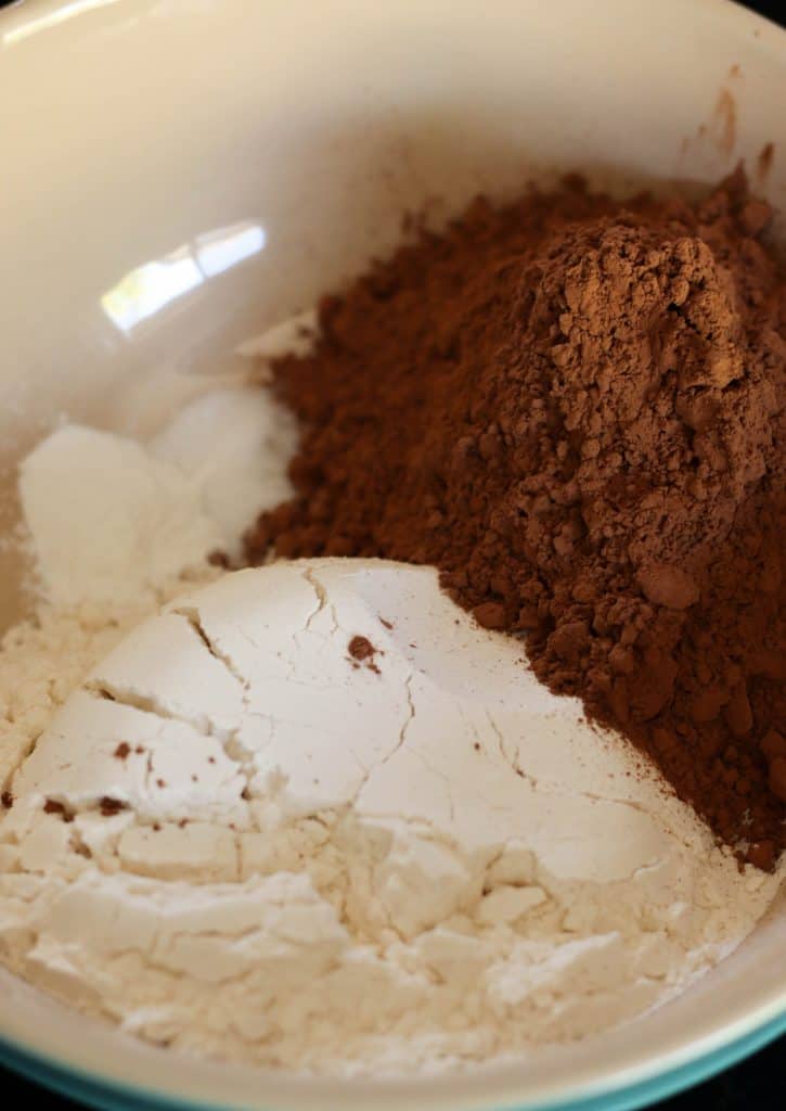 Cocoa powder and flour in a mixing bowl.