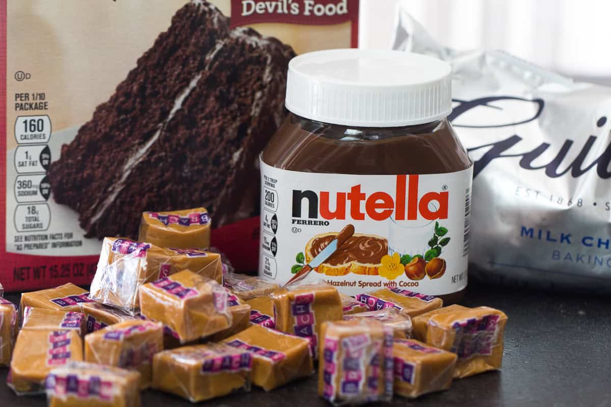 Ingredients needed to make Chocolate Caramel Nutella Cookies.
