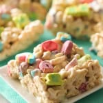 Lucky Cereal Bars served on white plates on a green background.