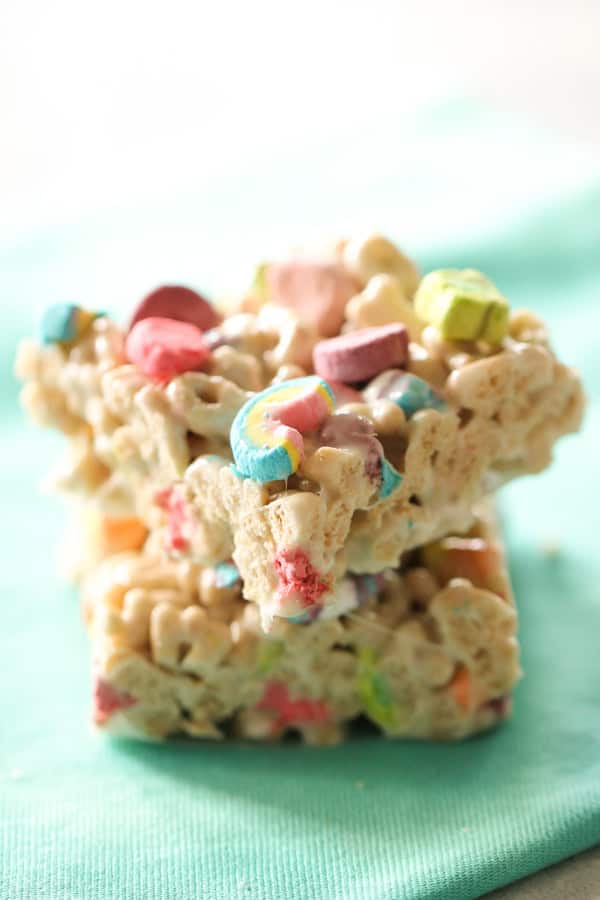 Lucky charms bars cut into squares stacked