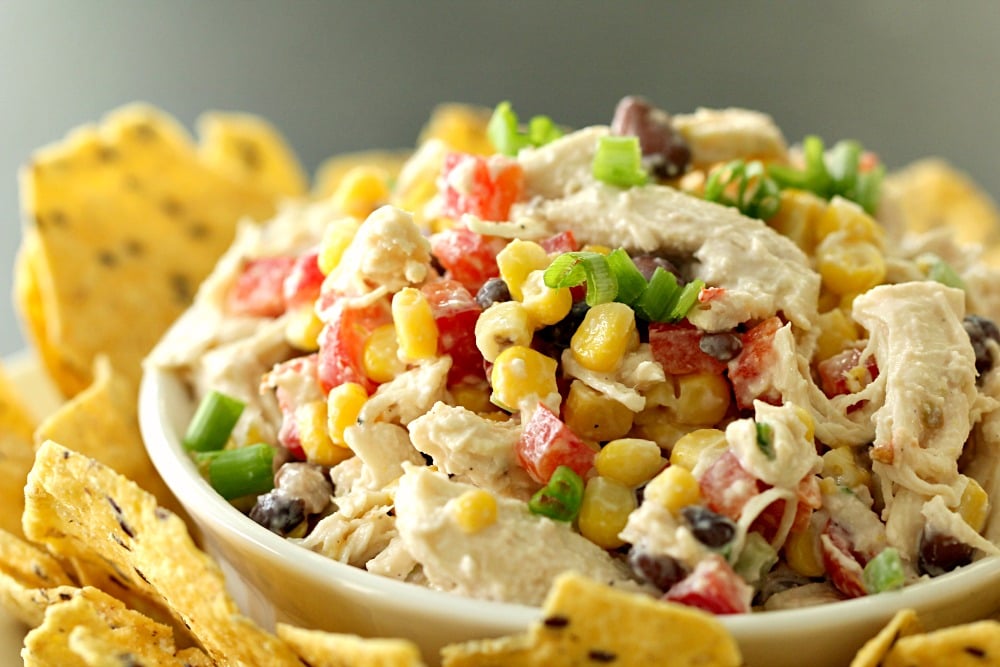 Southwest Chicken Salad in a bowl surrounded by tortilla chips