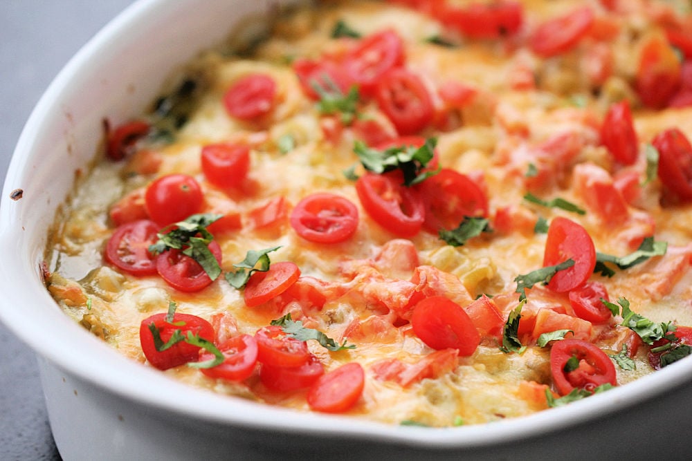 Southwest-chicken-casserole-straight-out-of-the-oven-with-tomatoes-on-top