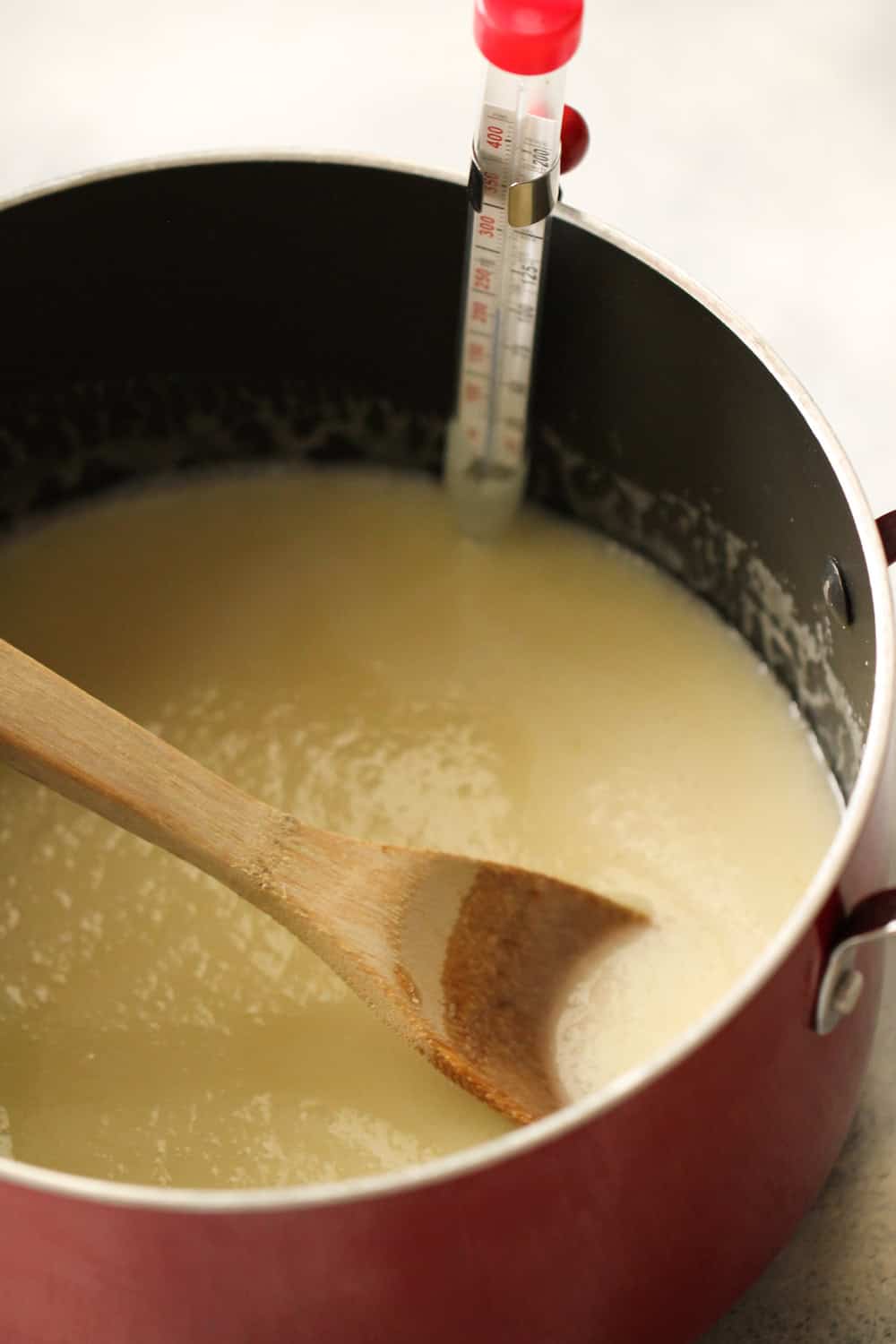 Butter and sugar mixture boiling to the softball stage in pan