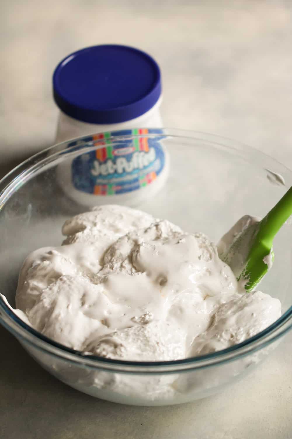 Marshmallow creme in a glass mixing bowl