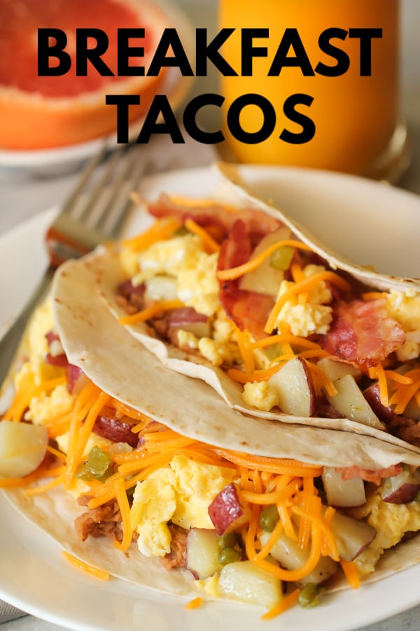 Breakfast Tacos on a plate with a fork