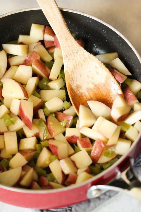 Peppers and potatoes in a skillet