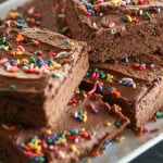 Chocolate Sugar Cookie Bars cut into squares on a serving plate.