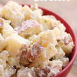 red potato salad with dill in serving bowl