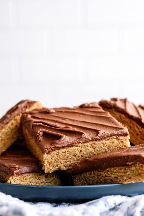 A stack of Cake Mix Peanut Butter Bars on a plate.