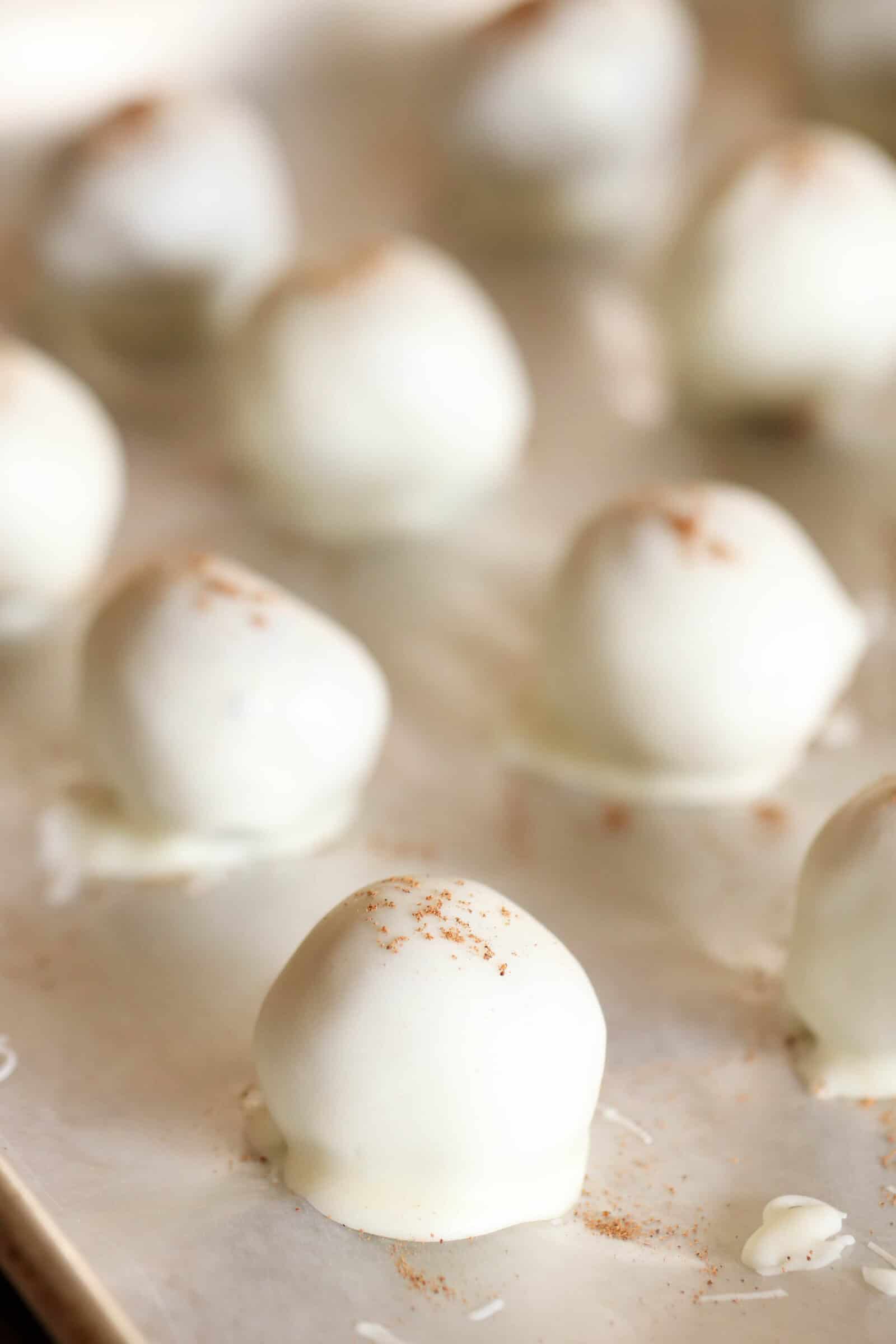 Gingerbread Truffles on a cookie sheet after being refrigerated