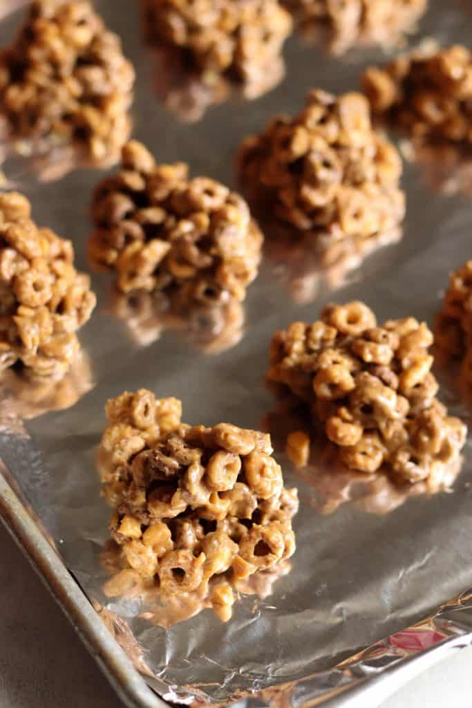 Peanut Butter Breakfast Bites on a foil lined baking sheet.