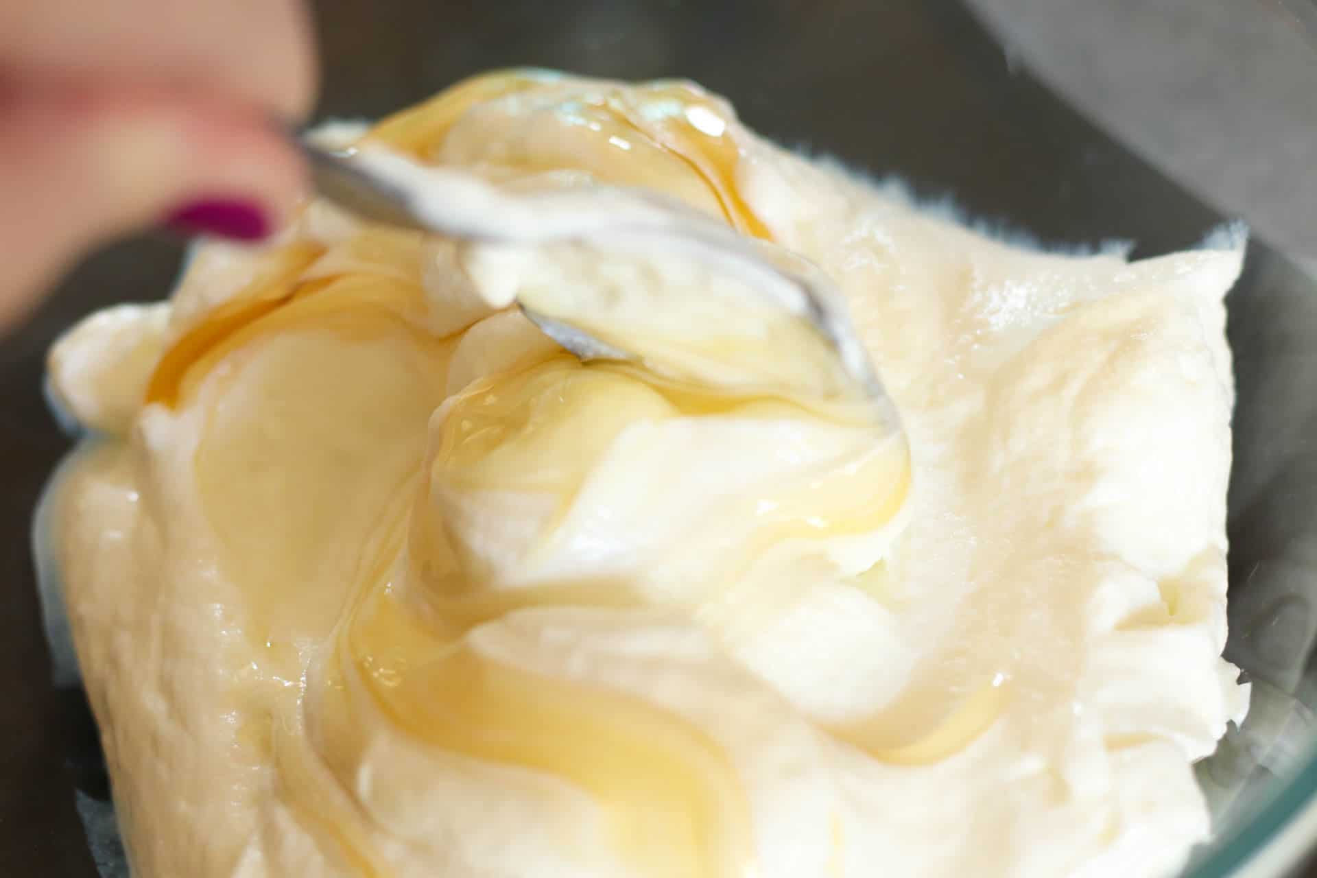 Honey and Yogurt mixture in a small bowl