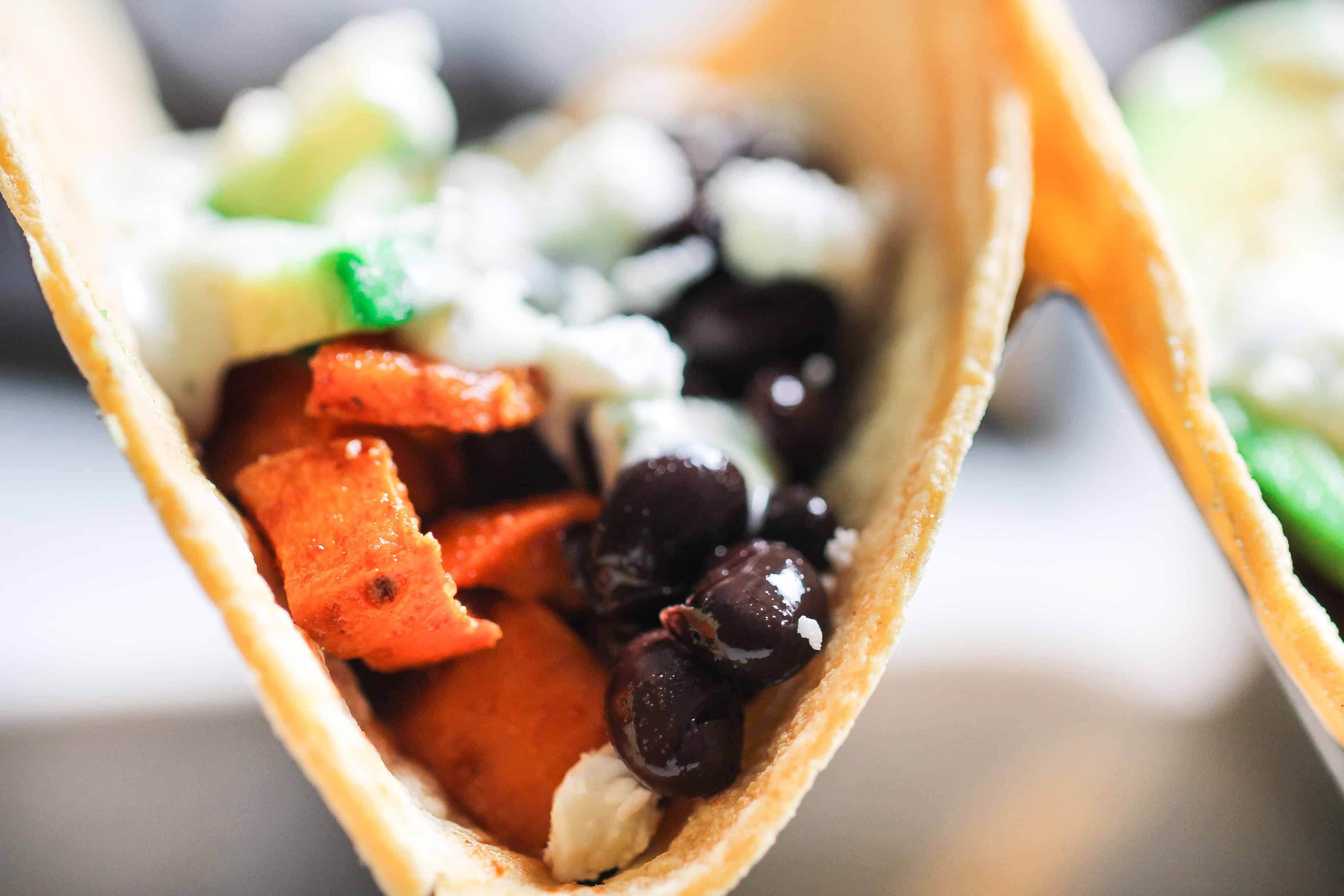 close up picture of black bean sweet potato tacos