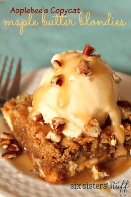 Applebee's Copycat Maple Butter Blondie on a plate topped with a scoop of vanilla ice cream.