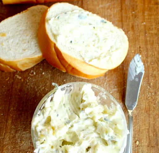 homemade garlic butter spread on roll