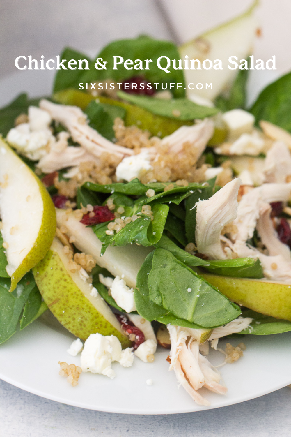 chicken and pear quinoa salad on a plate