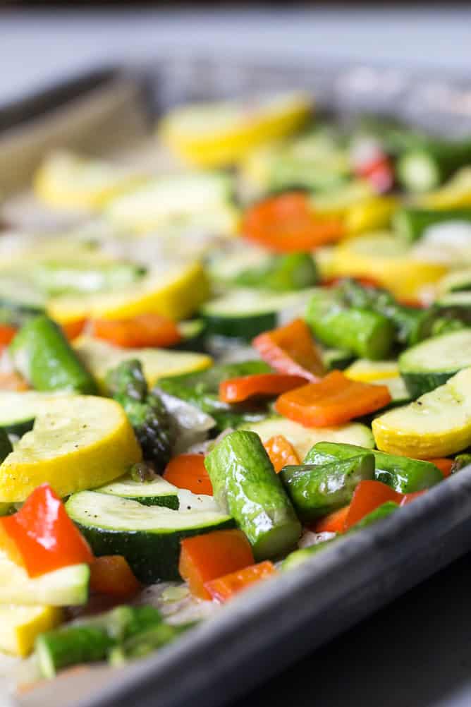 Chopped veggies on baking sheet