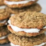 Oatmeal Creme Pies stacked on top of each other.