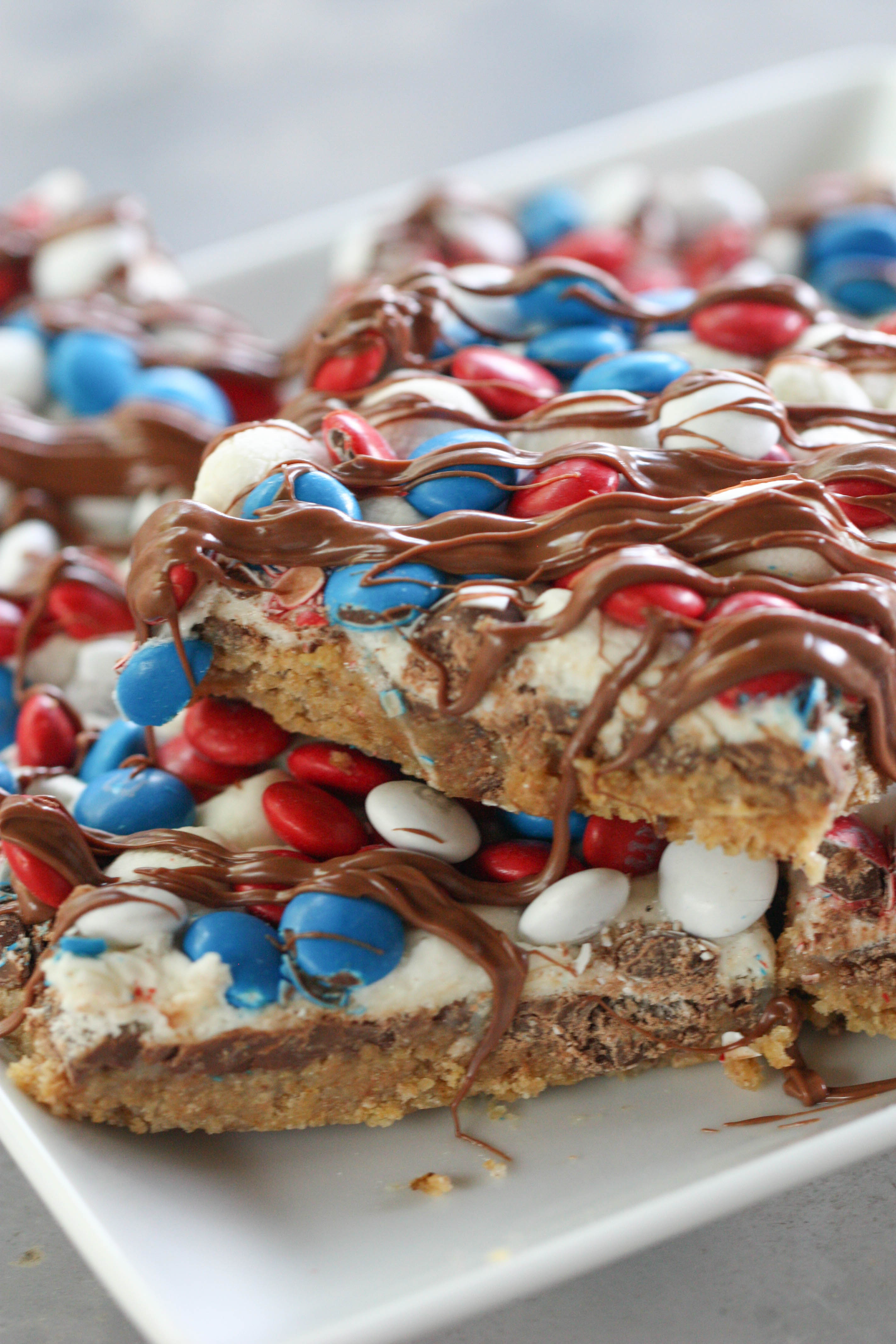 S'mores Magic Bars with Chocolate drizzle on top