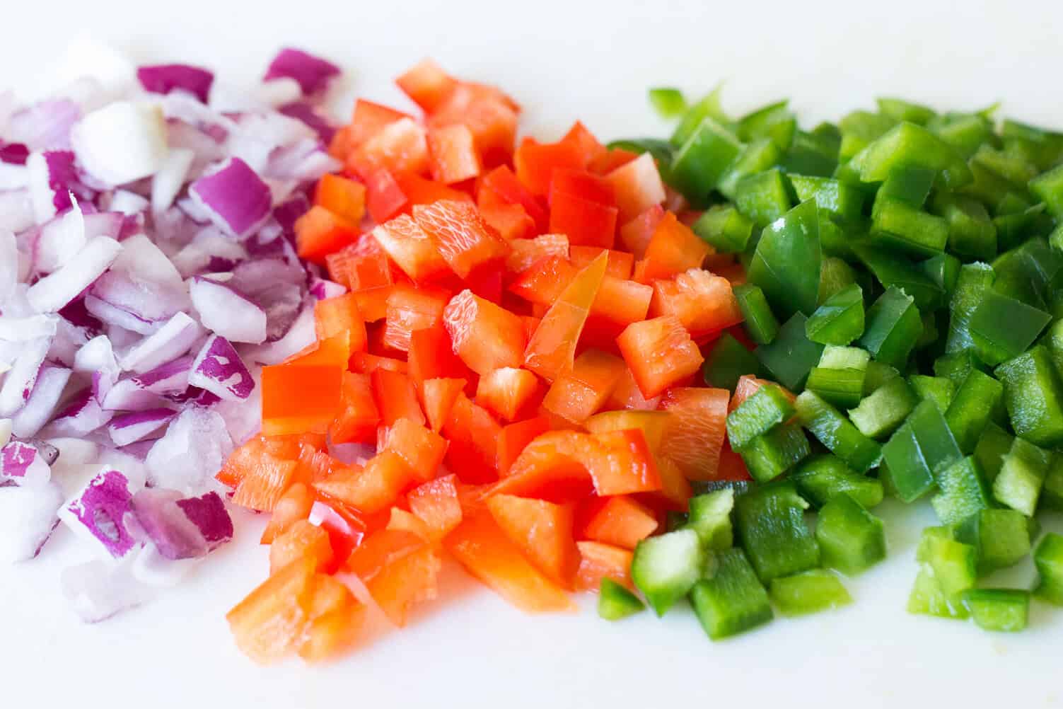 chopped veggies for Creamy Black Bean Salsa