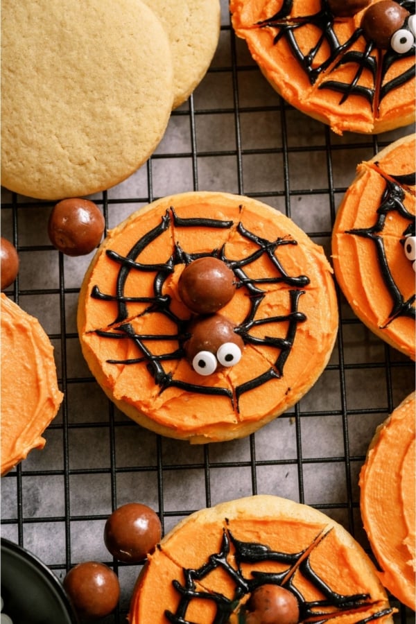 Top view of Spider Web Sugar Cookies on a cooling rack.
