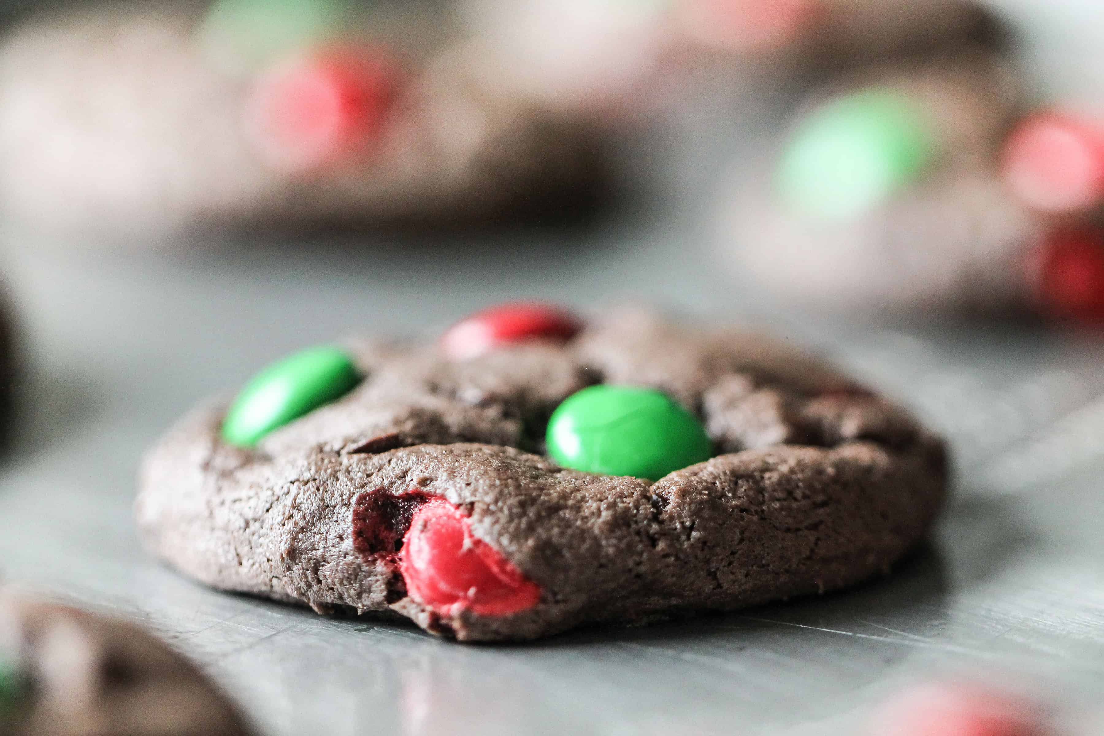 Close up of a Cake Mix Christmas Cookie baked on a baking sheet.