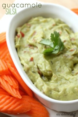 Guacamole Salsa dip in white dish garnished with cilantro