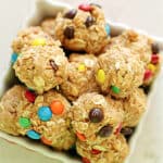 No Bake Oatmeal Peanut Butter Balls with M&M's in a white dish.
