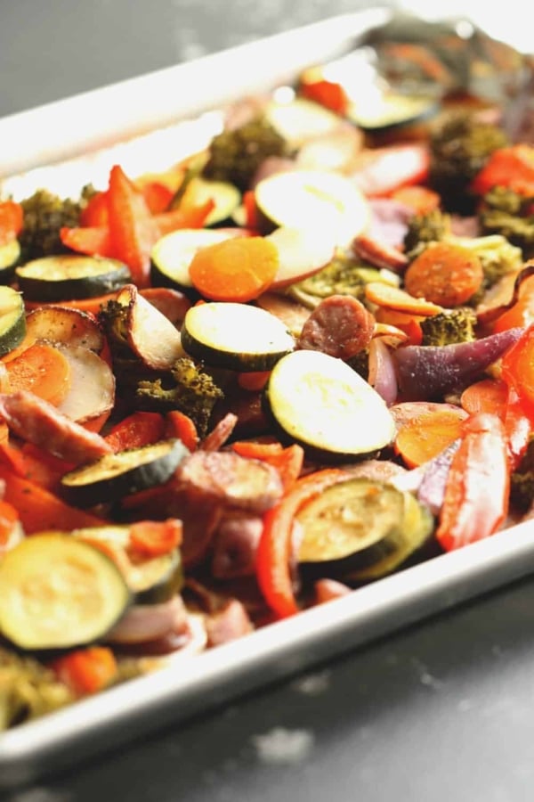 one pan chicken sausage and vegetables on a sheet pan