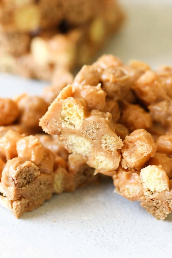 Two Reese’s Puffs Snack Bars stacked and one in the background.