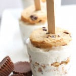 Reese’s Cookie Ice Cream Pops on a serving tray with mini reeses.
