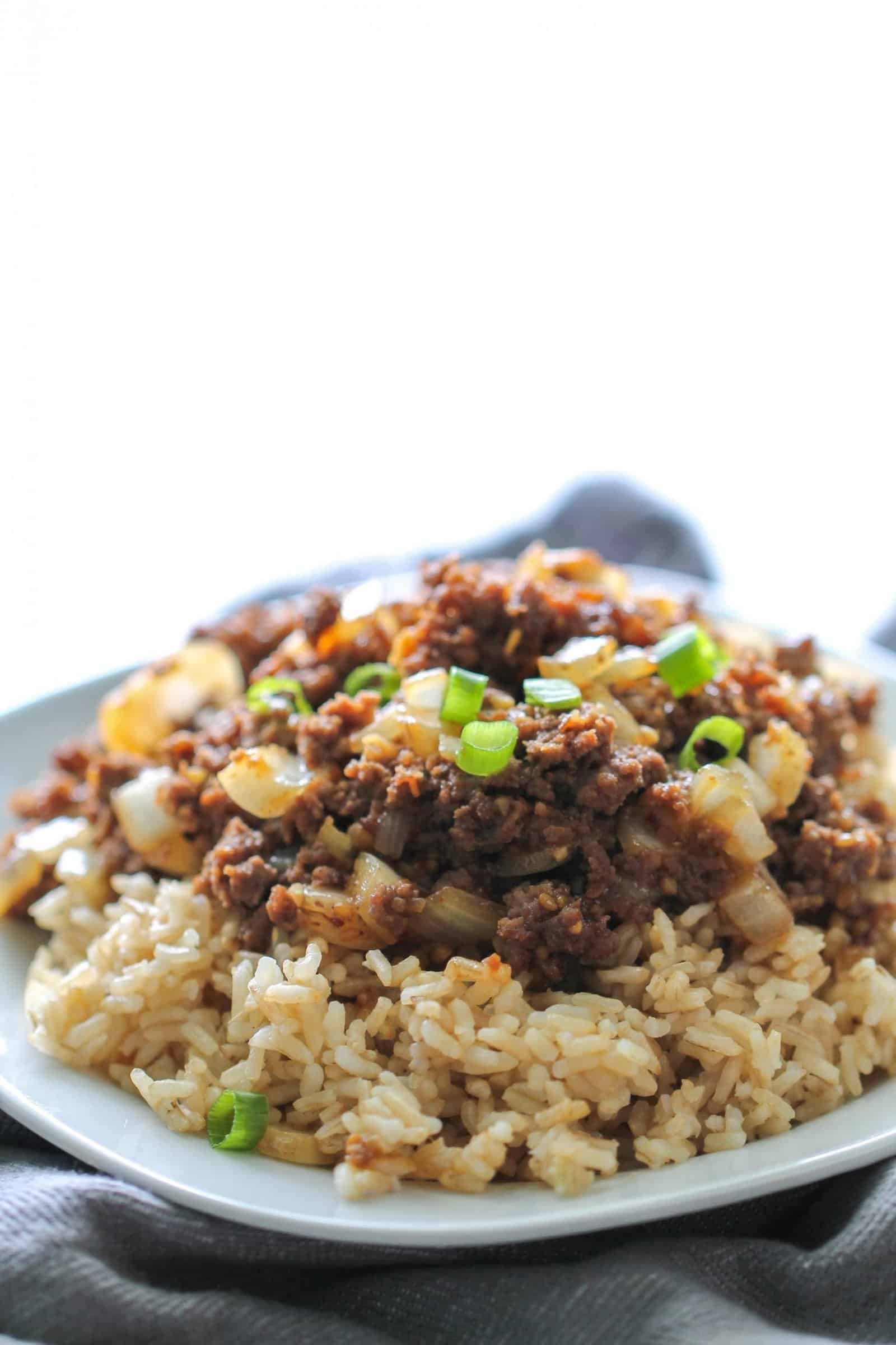 teriyaki beef skillet on a white plate