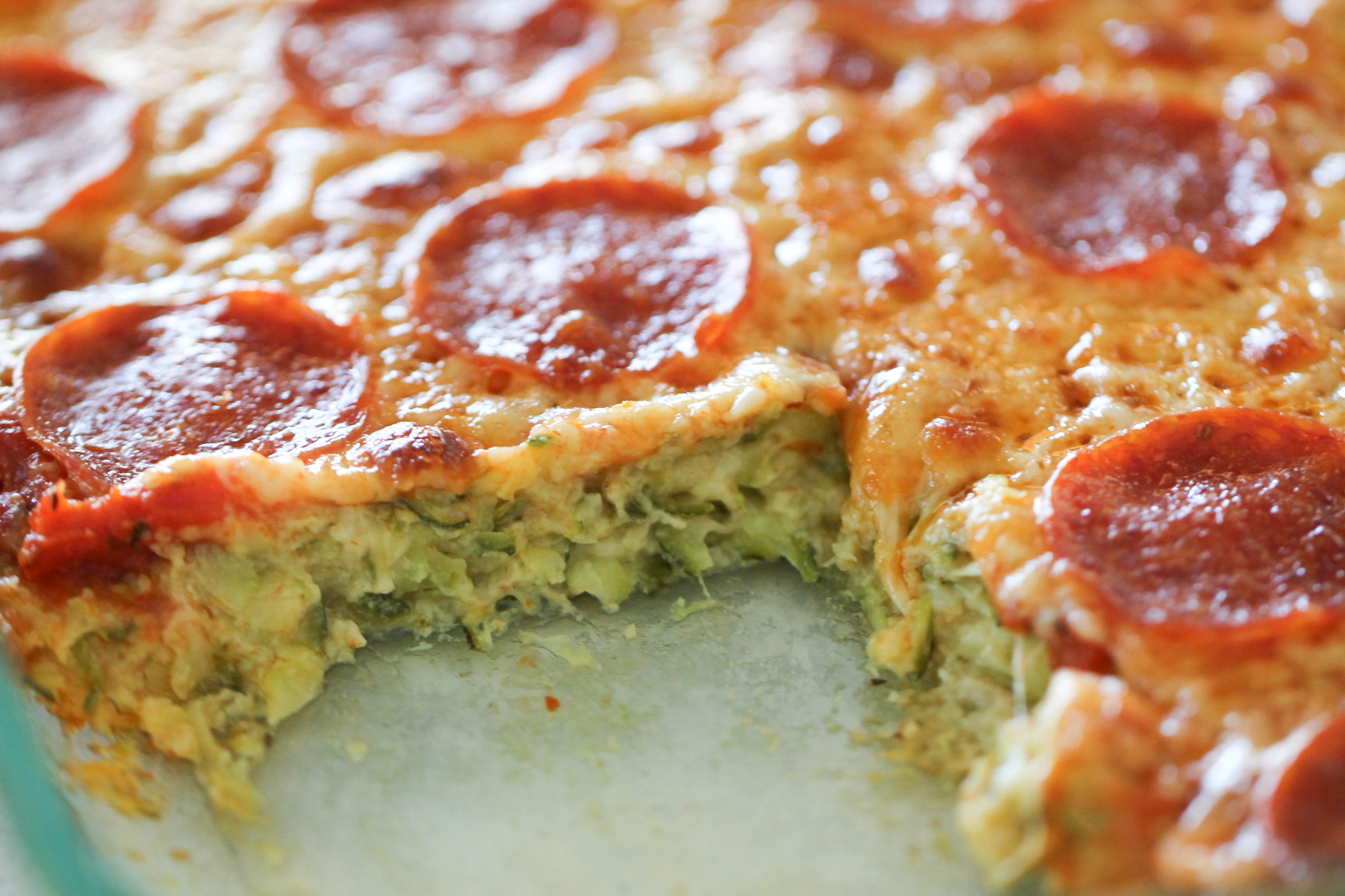Zucchini Pizza Casserole with a slice missing
