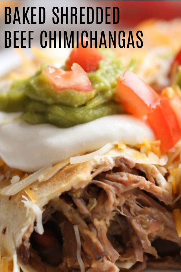 Baked Shredded Beef Chimichanga on plate with toppings