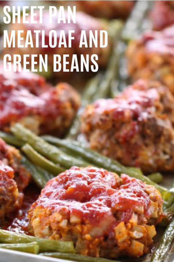 Meatloaf patties and green beans on a baking sheet.