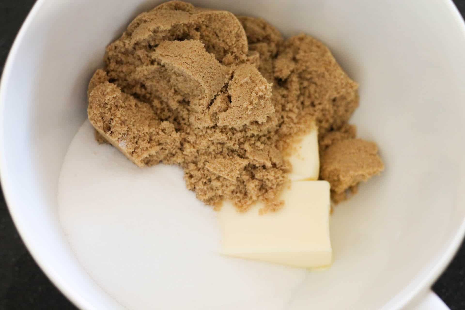 Sugar and Butter in a small white mixing bowl