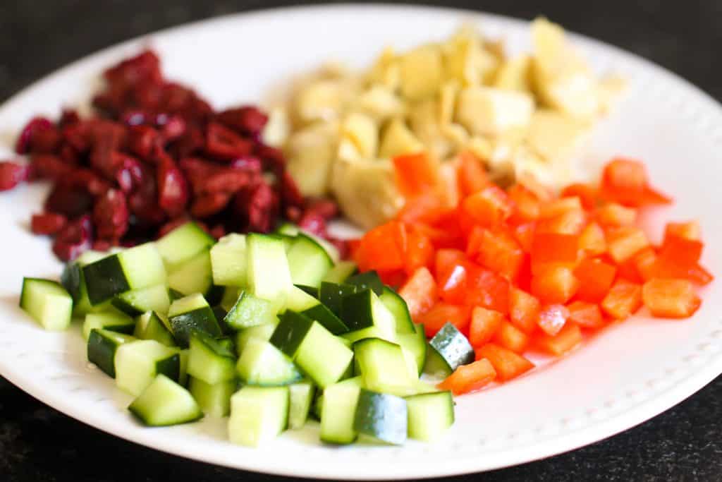 Chopped veggies on a white plate.