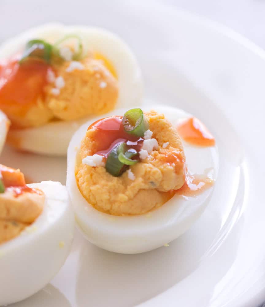 Buffalo Ranch Deviled Eggs on a plate