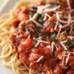 A plate of spaghetti topped with Ground Turkey Spaghetti Sauce.