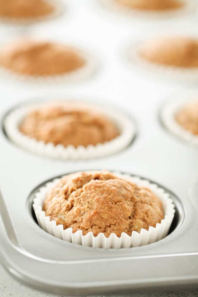 Healthy Whole Wheat Banana Muffins in a muffin tin