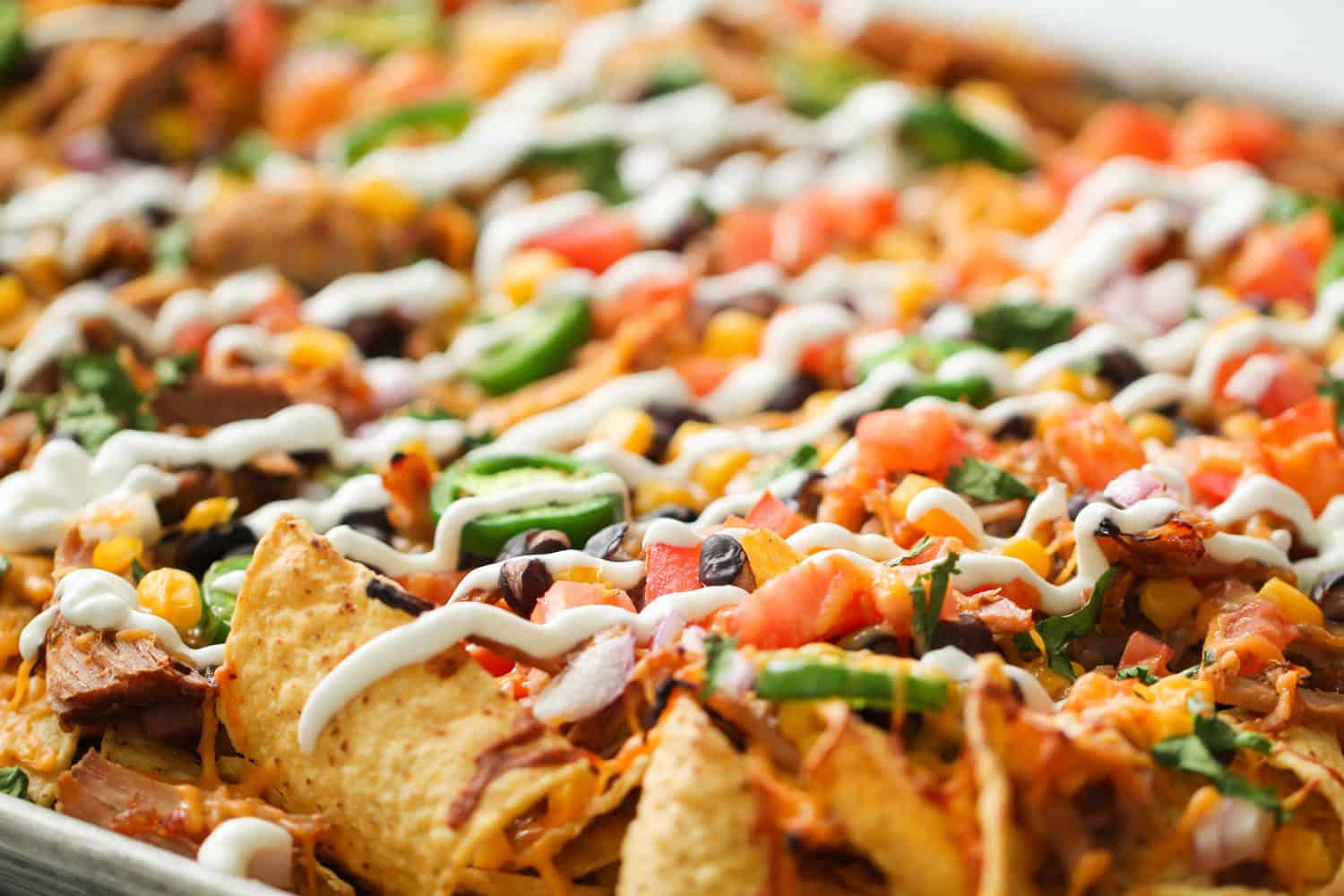 Loaded Sweet Pork Sheet Pan Nachos 